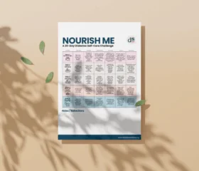 A Nourish Me: 30-Day Diabetes Self-Care Challenge calendar lies on a tan surface with leaf shadows. The chart lists daily wellness tasks in small boxes, with space for notes at the bottom.