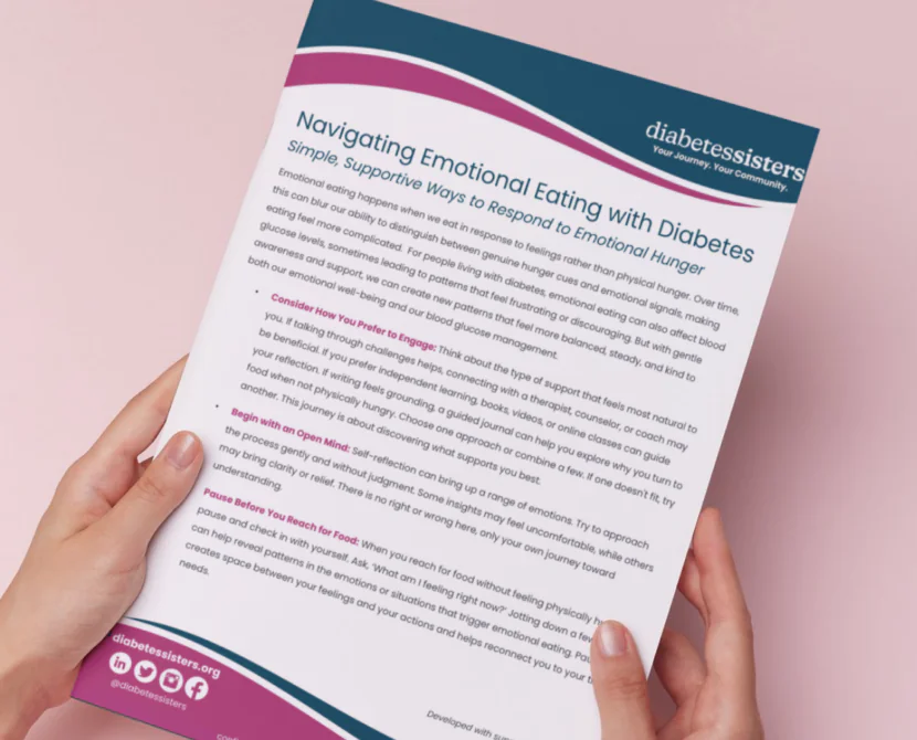 A hand holds a diabetes education flyer titled Navigating Emotional Eating with Diabetes. The flyer features tips on managing emotional hunger for heart health and diabetes, plus contact info for DiabetesSisters at the bottom.